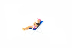 Miniature people office, worker and swimming beach sport concept in variety action on white background 