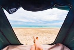 Rooftop tent camping by the beach