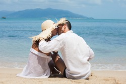 Couple kissing on a beautiful beach