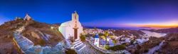 Panorama of Ios Chora and old harbor at sunset, Cyclades, Greece.