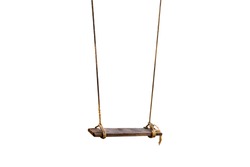 The old rope wooden swing. Isolated background
