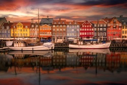 Nyhavn waterfront, canal and entertainment district at sunset. Copenhagen, Denmark