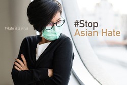 Stop asian hate hashtag, support Asian americans communities, stop hate crimes campaign. Portrait of a smart asian woman with face mask. Hate is a virus, Against racism, Campaign, Anti-AAPI, Concept.