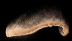 Small size fine Sand flying explosion, Golden grain wave explode. Abstract cloud fly. Yellow colored sand splash silica in Air, Galaxy star universe sign symbol. Element Black background Isolated