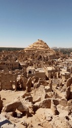 Photo of ancient buildings in the desert