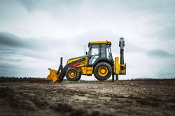 Yellow bulldozer overcome barrier