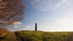 A chimney from disused copper smelting industry stands on Troopers Hill in the St George neighbourhood of Bristol.