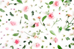 Floral pattern made of pink and beige roses, green leaves, branches on white background. Flat lay, top view. Valentine's background