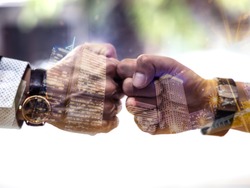 Double exposure Businessmen trust commitment as  support which Business Partners holding hands relationship marketing for reach successful achievement and meeting commit concept