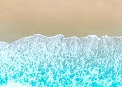 Aerial Top view of Blue wave in ocean. Breaking wave  background and sun light