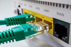 white router includes two green cable connectors rg45, home router