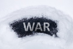 the snow was removed from the ice underneath it turned out to be the word war. war in winter, cold war