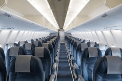 Inside empty passenger airplane cabin