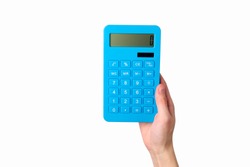 Hand holds blue calculator Isolated on a white background.