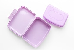 Empty purple lunch boxes, top view. Plastic container for food
