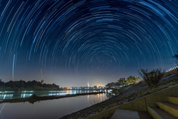 A star trail is a type of photograph that utilizes long-exposure times to capture the apparent motion of stars in the night sky due to the rotation of the Earth.