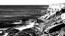 Black and white photo rock shoreline Australia 