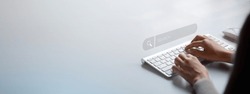 The user is typing a keyboard with a hologram search box. Searching information on the Internet, cloud information online can search information from all over the world. Search engine.