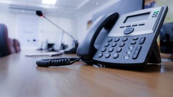 Communication Technology system for Conference and meeting is concept. IP Telephone in Conference room background