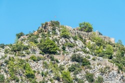 Ruins of Alara Castle sitting on a massive rocky hill in Alanya, Turkey. The castle dates from the 13th century.