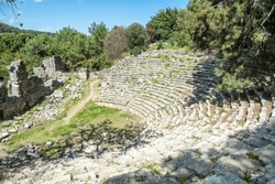Ruined amphitheatre at Phaselis ancient site in Antalya, Turkey. Phaselis was a Greek and Roman city on the coast of ancient Lycia. Its ruins are located north of the modern town Tekirova