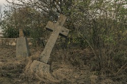 Old Stone Cross Grave Markers on Abandoned Cemetery