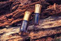 Oil Oudh. Arabic oil Oud natural background of tree bark. 