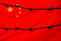 national flag of China on textured background, rows of barbed wire, concept of war, revolution, armed uprising in country, increase in crime in state, terrorist attack, redistribution of power