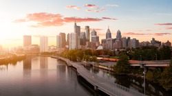 Philadelphia, Pennsylvania, United States of America. Aerial Panoramic View of a Modern Downtown City. Sunset Sky Composite. Cityscape Panorama