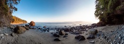 Panoramic View of Mystic Beach on the West Coast of Pacific Ocean. Summer Sunny Sunset. Canadian Nature Landscape Background Panorama. Located near Victoria, Vancouver Island, BC, Canada.