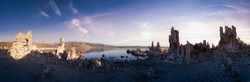 Tufa towers rock formation in Mono Lake. Dramatic Sunrise Sky Art Render. Located in Lee Vining, California, United States of America. Nature Background.