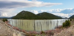 Panoramic View of Earthquake Lake with American Mountain Landscape. Cloudy Day Art Render. Montana, United States of America. Nature Background Panorama