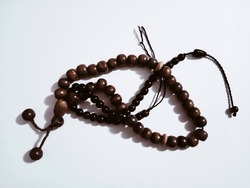 Prayer beads made out of kaukah wood.
