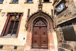 An ornate doorway on the exterior of the Prague Astronomical Clock.