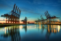 Container terminal Burchardkai in the port of Hamburg during blue hour