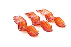Cooked slices of bacon on white background