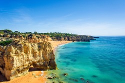 a view of beautiful sandy beach Dona Ana in Lagos, Algarve region, Portugal