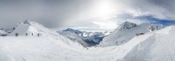 Sunny panoramic view of Dolomites from one of ski slopes, Trentino-Alto-Adige region, Italy.