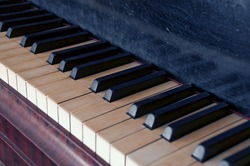 Closeup of old piano keyboard