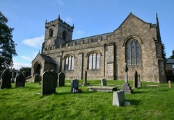 A view of St Leonard's church in the village of Downham, Clitheroe, Lancashire, England, Europe