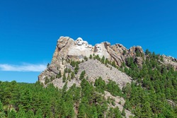 Mount Rushmore with US presidents carved portraits in summer, South Dakota, United States of America, USA.