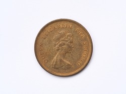 Macro view of the Hong Kong Dollars coin valued fifty cents  with the picture of Queen Elizabeth the Second 