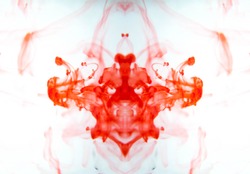 Blurred abstract background. Colorful inks in the water. Splash paint mixing. Watercolor effects. Ink pattern in Rorschach test style. 