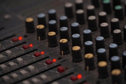 Mixer control. Music engineer. Backstage controls on an audio mixer, Sound mixer. Professional audio mixing console with lights, buttons, faders and sliders. sound check for concert. 