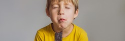 Close Up of Young Boy Eating A chocolate bar BANNER, LONG FORMAT