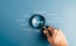 Magnifier focus to english language translation or translate on worldwide language conversation speaking concept.	