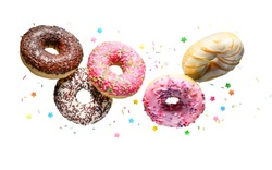 Donuts with sprinkles flying over white background.