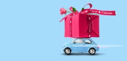 Valentines day background, banner. Blue car with red gift box on a roof with rose flower on a blue background. Copy space