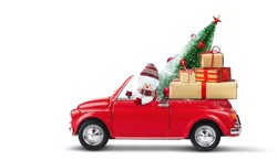 Snowman driving red car with christmas gifts and christmas tree isolated on a white background.