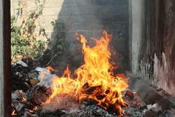 burning household waste in landfills. Unlike in cities, in villages there are no waste collection officers. So, people burn their household waste.